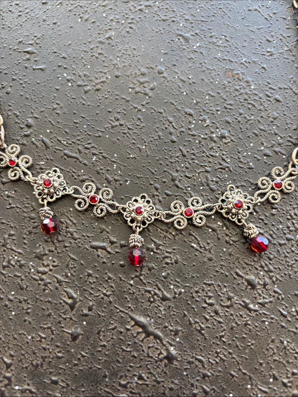 Vintage-Inspired Silver Necklace with Red Gem Accents